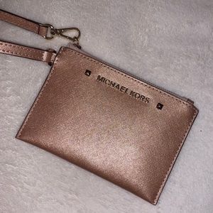 Michael Kors gold wristlet